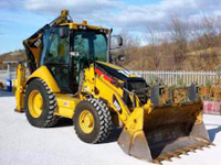 Buldoexcavator caterpilar 438B